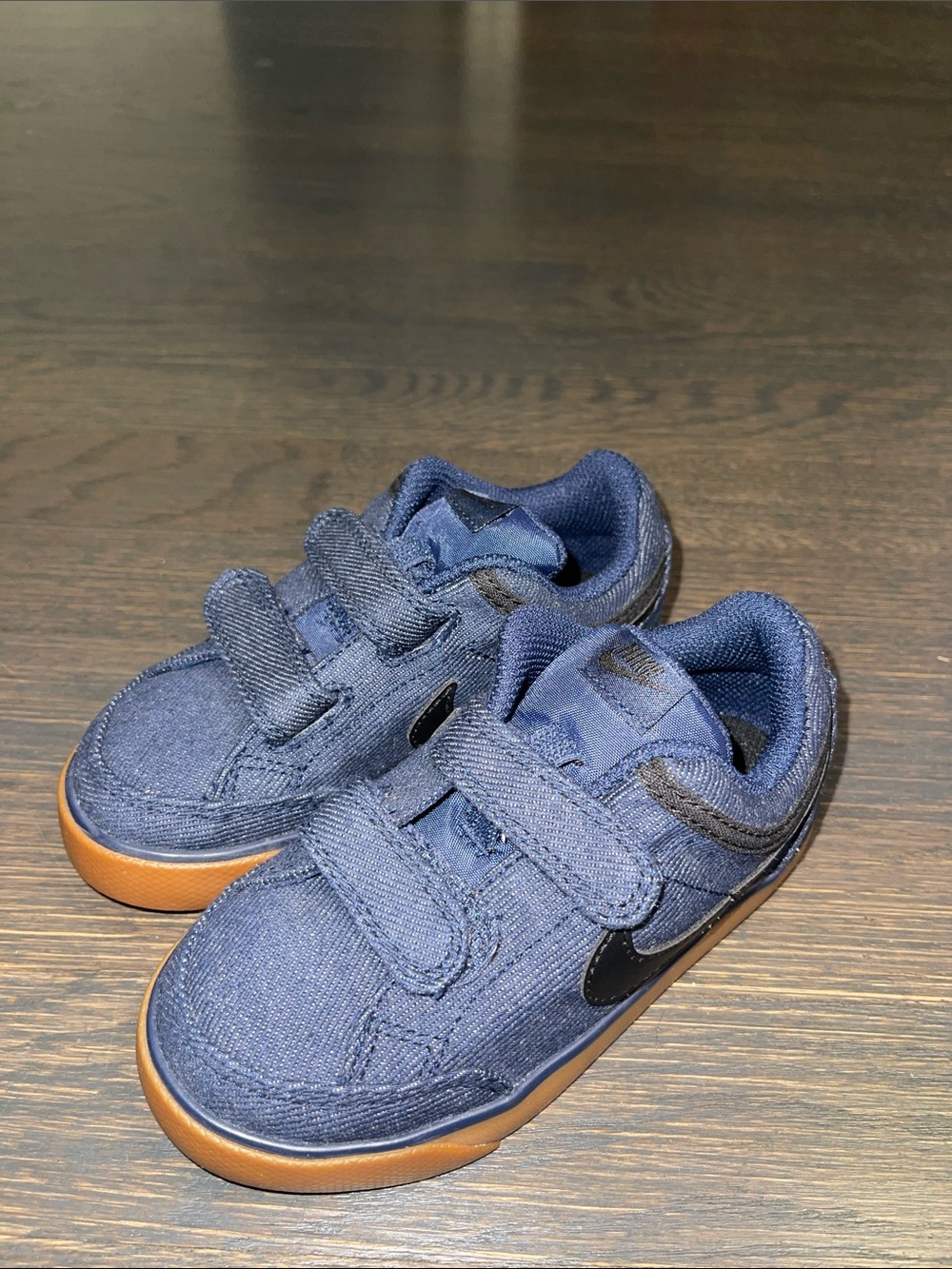 Nike Kids Navy Sneakers with Gum Sole and Black Swoosh